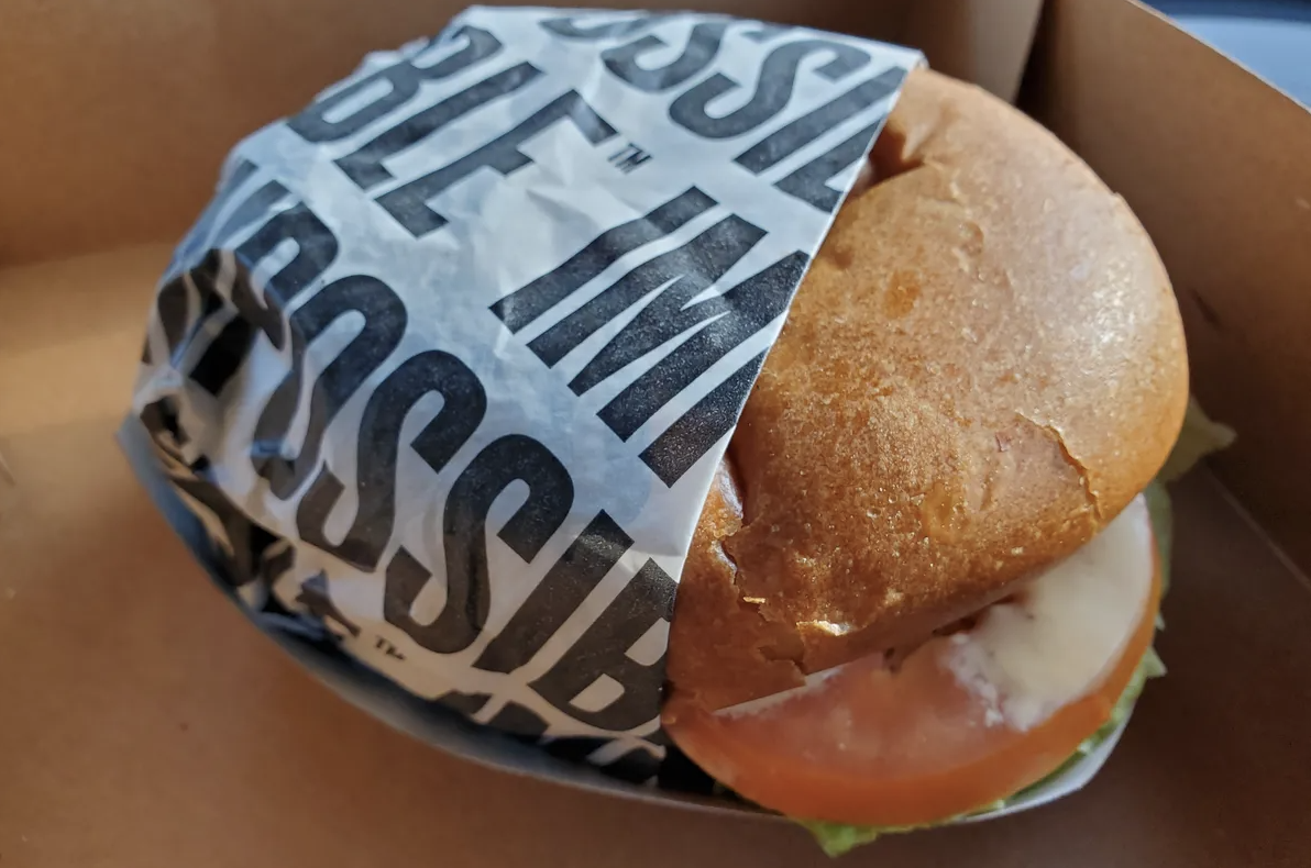 Prepared Impossible burger wrapped in branded paper